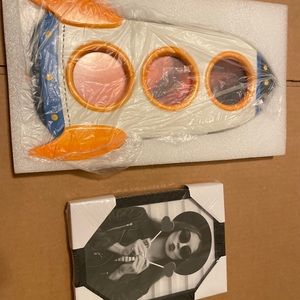 Brand new open box. Rocket ship 3 picture collage and small black picture fram